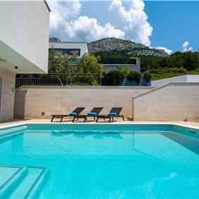 5 bedroom beachfront villa with heated pool near Omis, sleeps 9